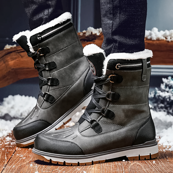 Men's mid-calf waterproof insulated snow boots with brown synthetic exterior and plush lining for winter warmth and protectio