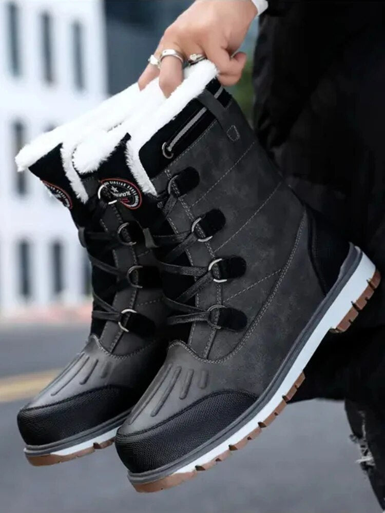 Men's mid-calf waterproof insulated snow boots with brown synthetic exterior and plush lining for winter warmth and protectio