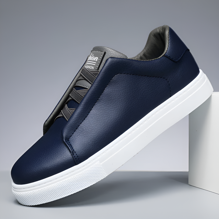 "Men's minimalist low-top sneakers; white and brown sleek profile, versatile for casual and semi-formal wear."