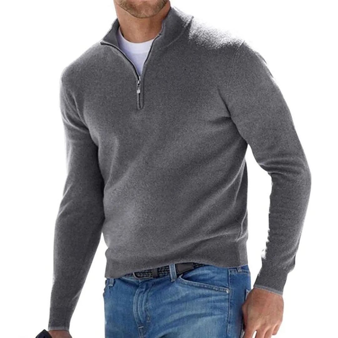 Full shot of a man wearing a smart-casual ribbed quarter-zip jumper, showcasing its fit and style.