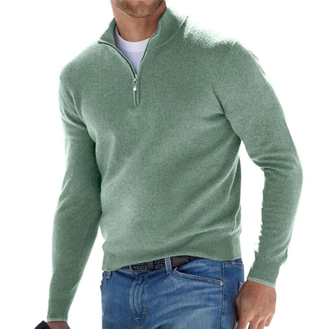 Detailed view of the collar and ribbed design on a men's quarter-zip knit sweater.
