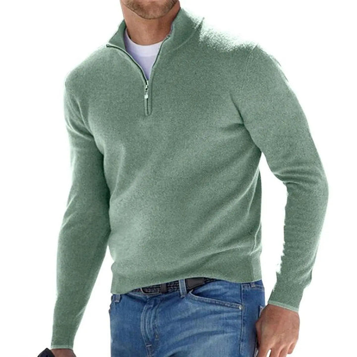 Detailed view of the collar and ribbed design on a men's quarter-zip knit sweater.