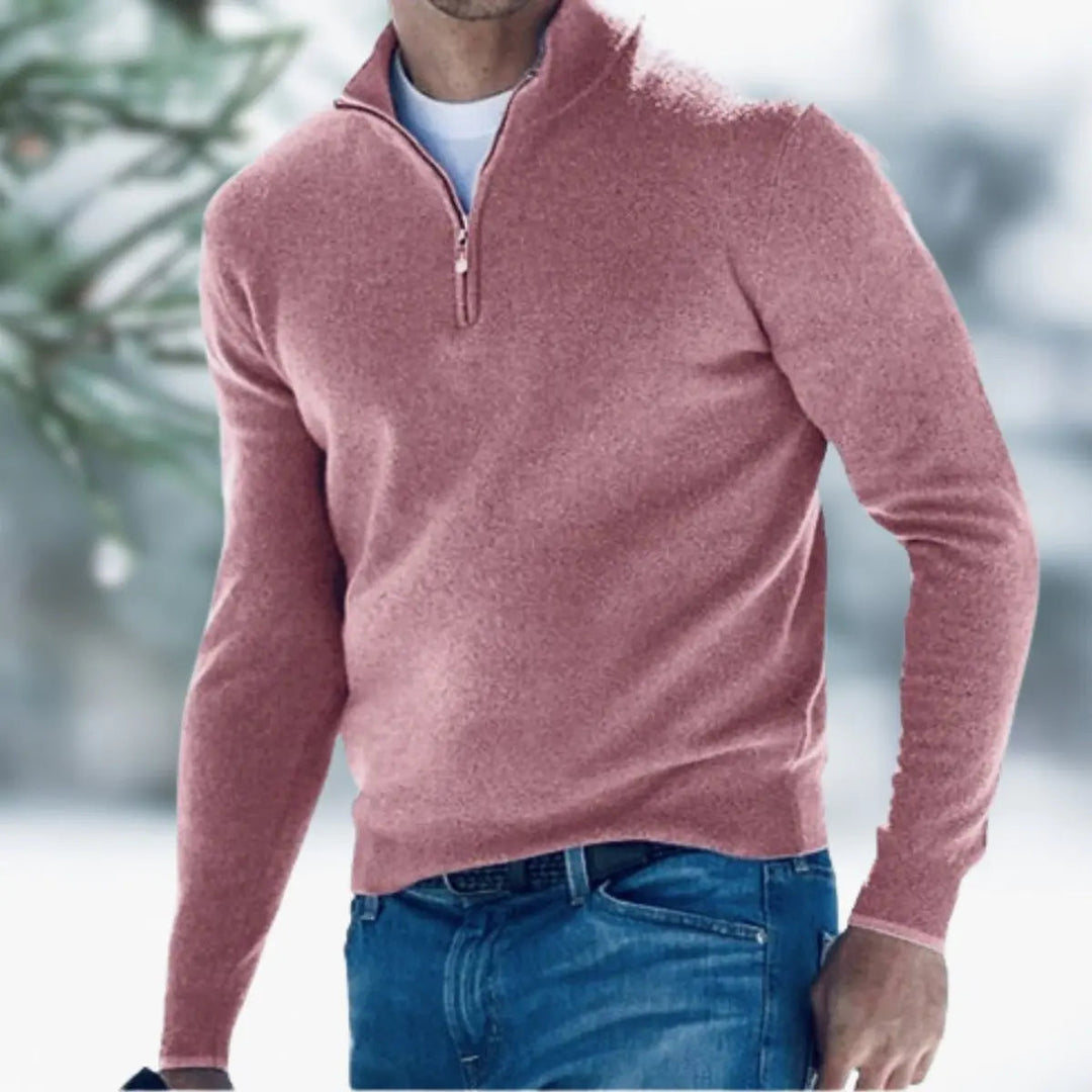 Man enjoying coffee, comfortably wearing a men's quarter-zip knit pullover jumper for casual moments.
