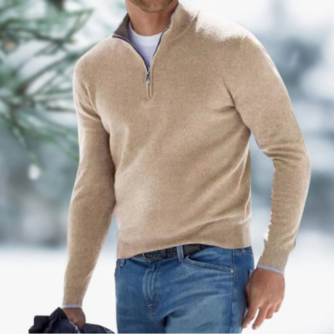 Close-up of the textured knit on a men's quarter-zip pullover jumper, showcasing quality & detail.