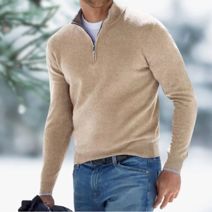 Close-up of the textured knit on a men's quarter-zip pullover jumper, showcasing quality & detail.