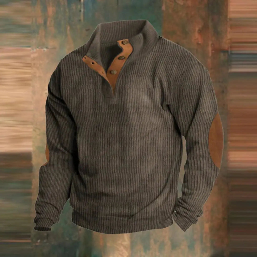 Vintage-inspired men's ribbed knit heritage quarter-snap sweater with stylish elbow patches. Classic casual pullover.