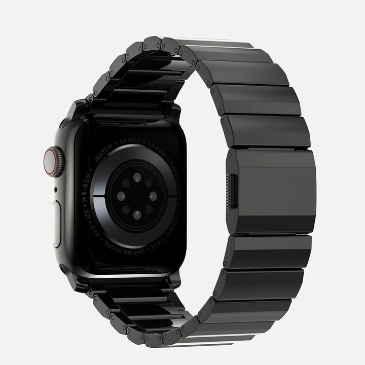 Men's sleek titanium watch band with shiny finish, magnetic clasp, durable and lightweight; perfect for daily or formal wear.