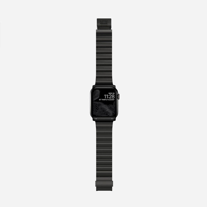 Men's sleek titanium watch band with shiny finish, magnetic clasp, durable and lightweight; perfect for daily or formal wear.