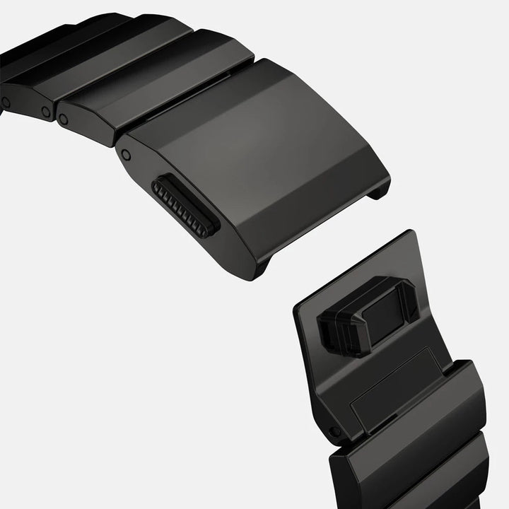 Men's sleek titanium watch band with shiny finish, magnetic clasp, durable and lightweight; perfect for daily or formal wear.