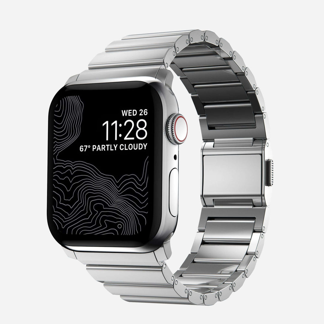 Men's sleek titanium watch band with shiny finish, magnetic clasp, durable and lightweight; perfect for daily or formal wear.