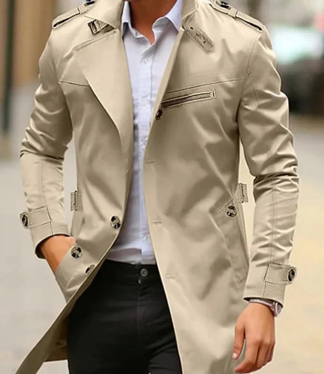 Men's slim-fit black trench coat with belt, ideal for smart casual or office wear. Stylish autumn outerwear.