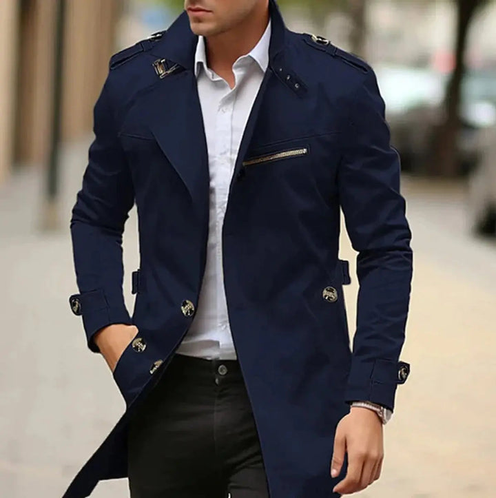 Tailored men's trench coat in a classic style, belted for a sleek slim fit. Perfect for autumn/winter city fashion.