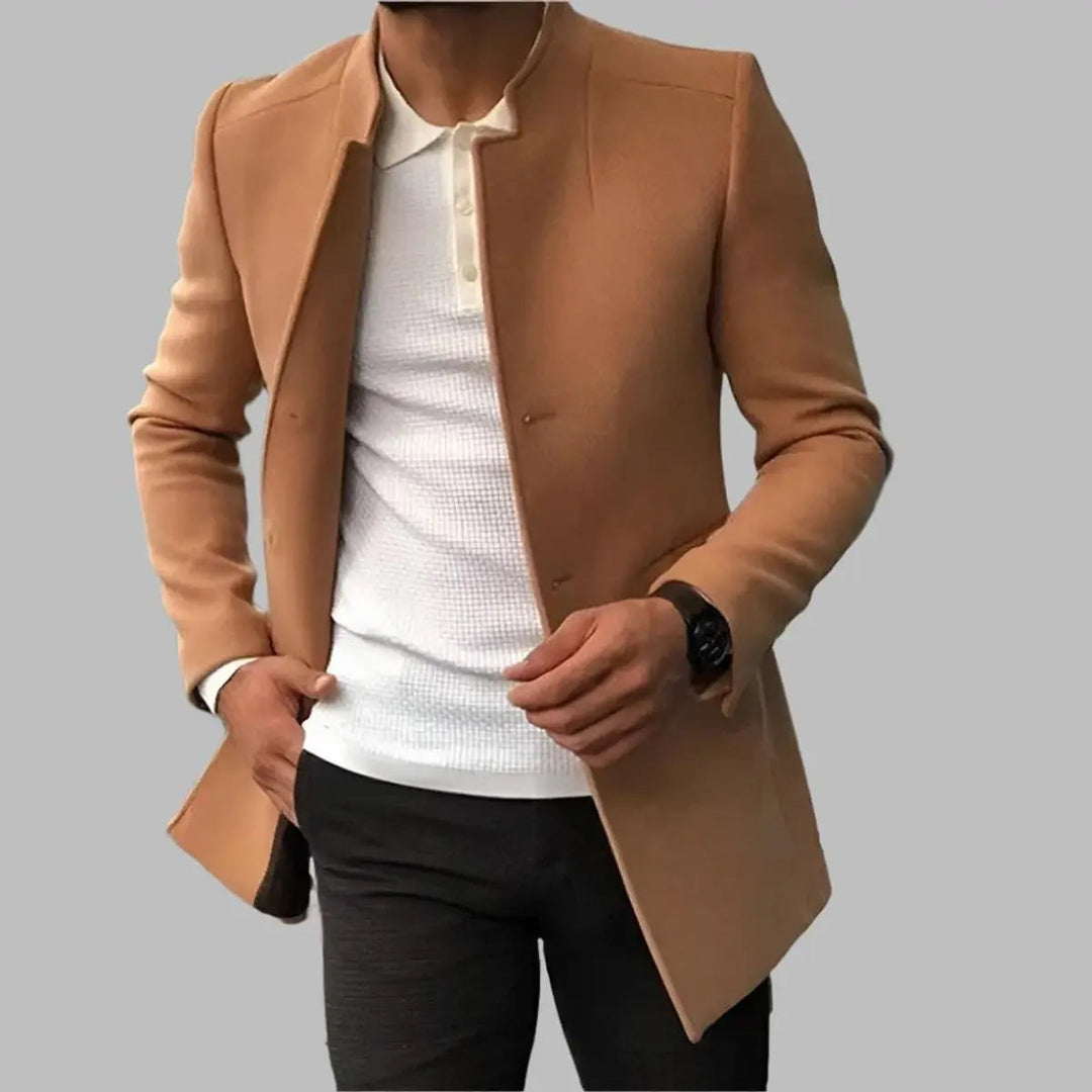 Smart men's tailored overcoat. This slim-fit collarless outerwear offers elegant winter fashion for formal looks.