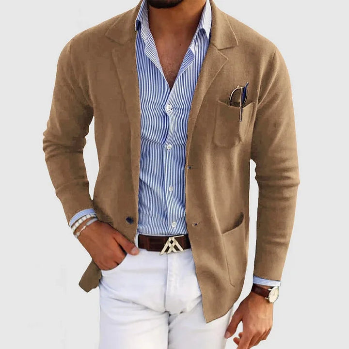 Men's tailored blazer with casual flap pockets, sharp silhouette, and versatile fit for modern style and comfort.