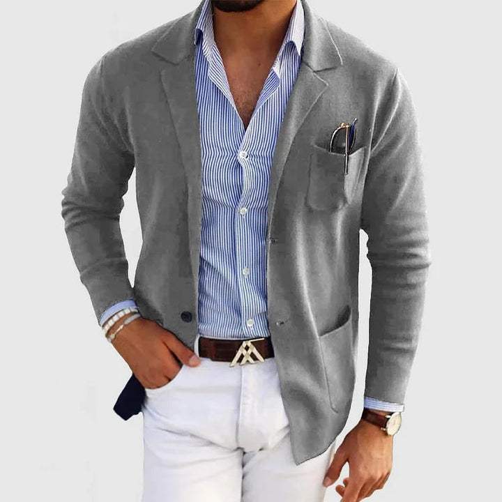 Men's tailored blazer with casual flap pockets, sharp silhouette, and versatile fit for modern style and comfort.