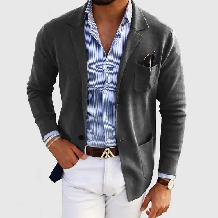 Men's tailored blazer with casual flap pockets, sharp silhouette, and versatile fit for modern style and comfort.