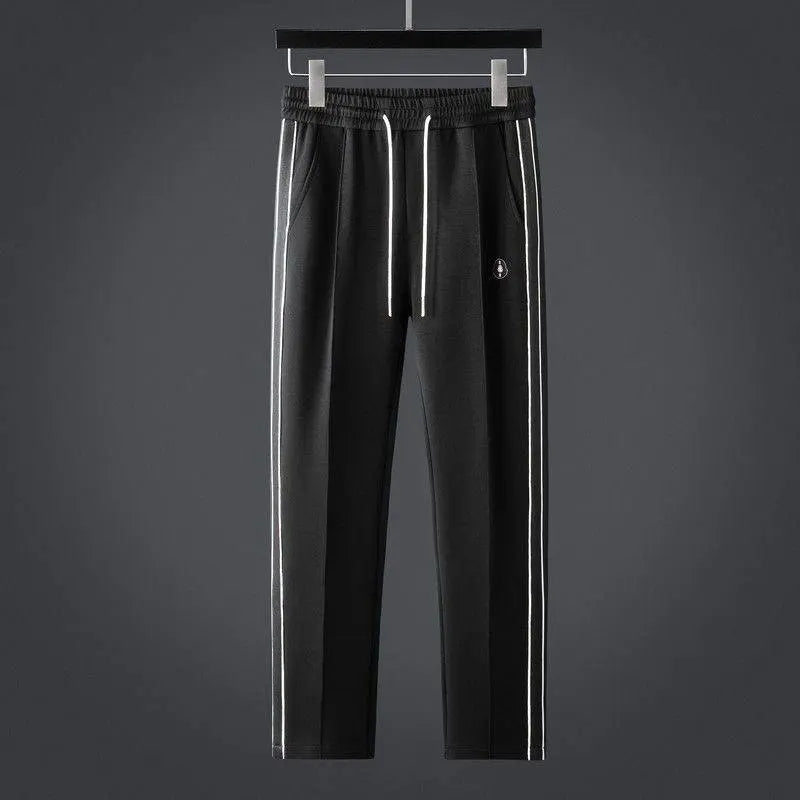 Soft men's loungewear tracksuit set with zip jacket & joggers for ultimate comfort.