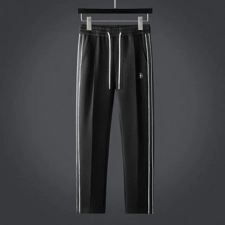 Soft men's loungewear tracksuit set with zip jacket & joggers for ultimate comfort.