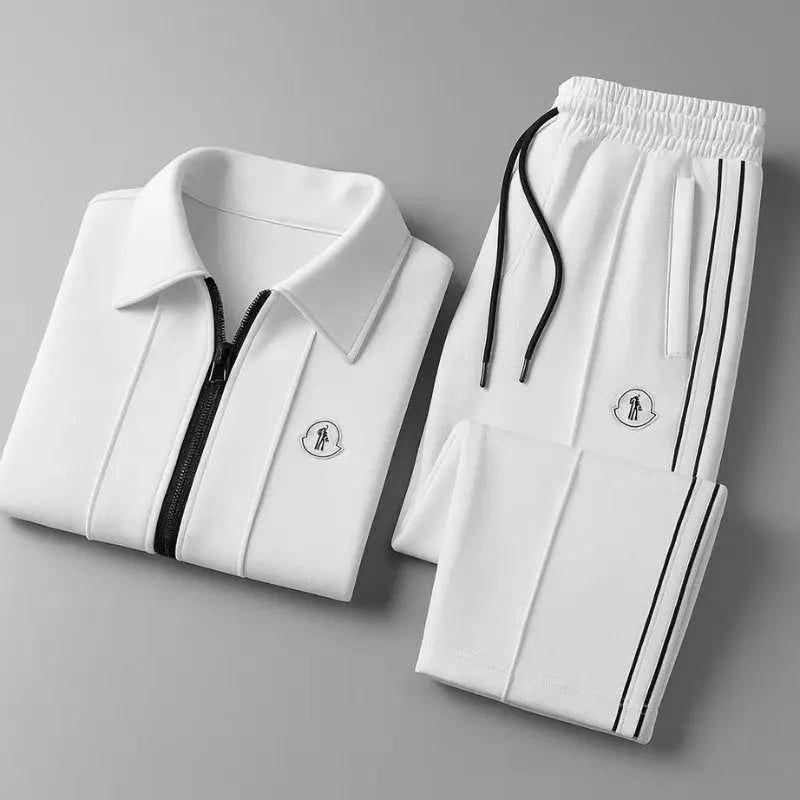 Stylish men's two-piece tracksuit with a modern zip-up jacket & comfortable athletic joggers.