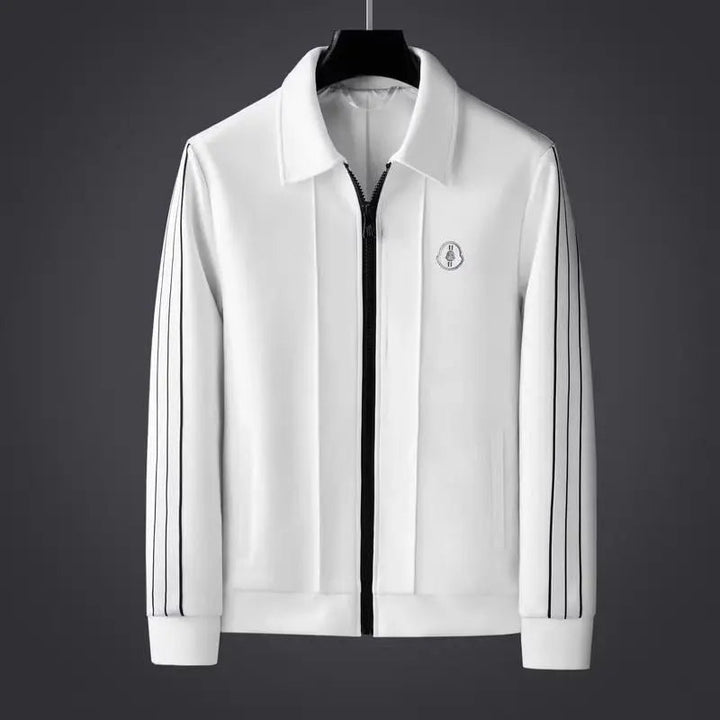 Minimalist men's athletic tracksuit set, featuring sleek zip jacket & comfortable joggers.