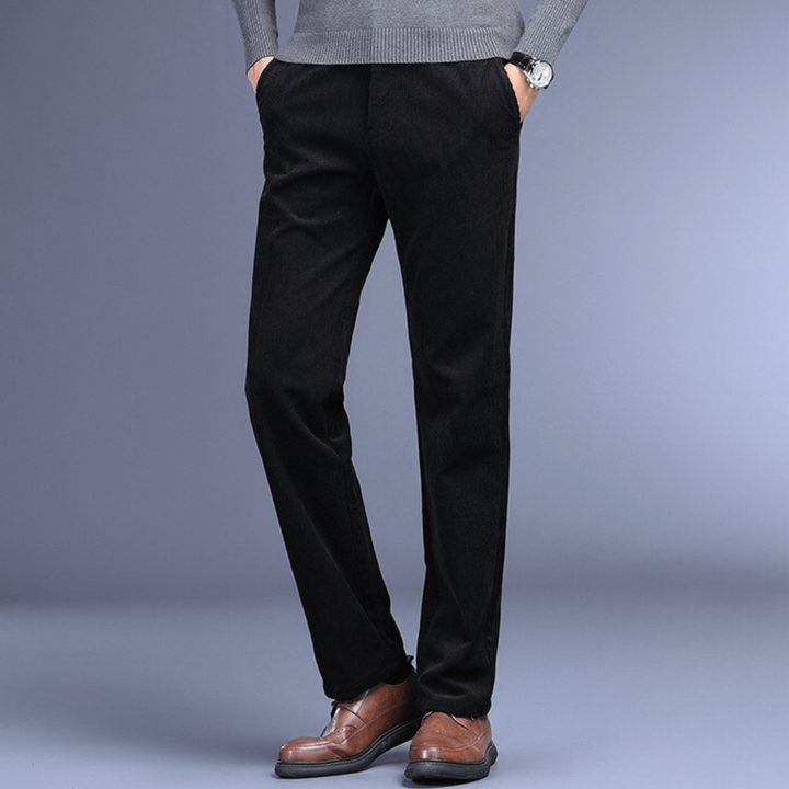 "Men's ultra-soft corduroy trousers with 4-way stretch, deep pockets, ideal for formal wear in black, brown, khaki, or navy."