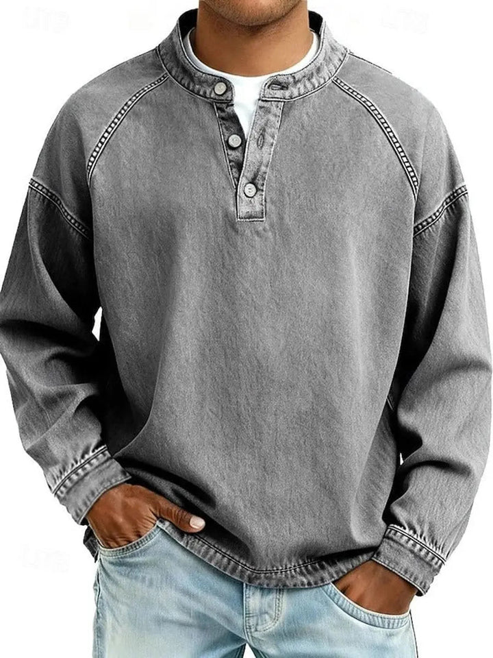 Men's vintage grey Henley long sleeve pullover. Classic casual top with button placket, perfect for everyday comfort.