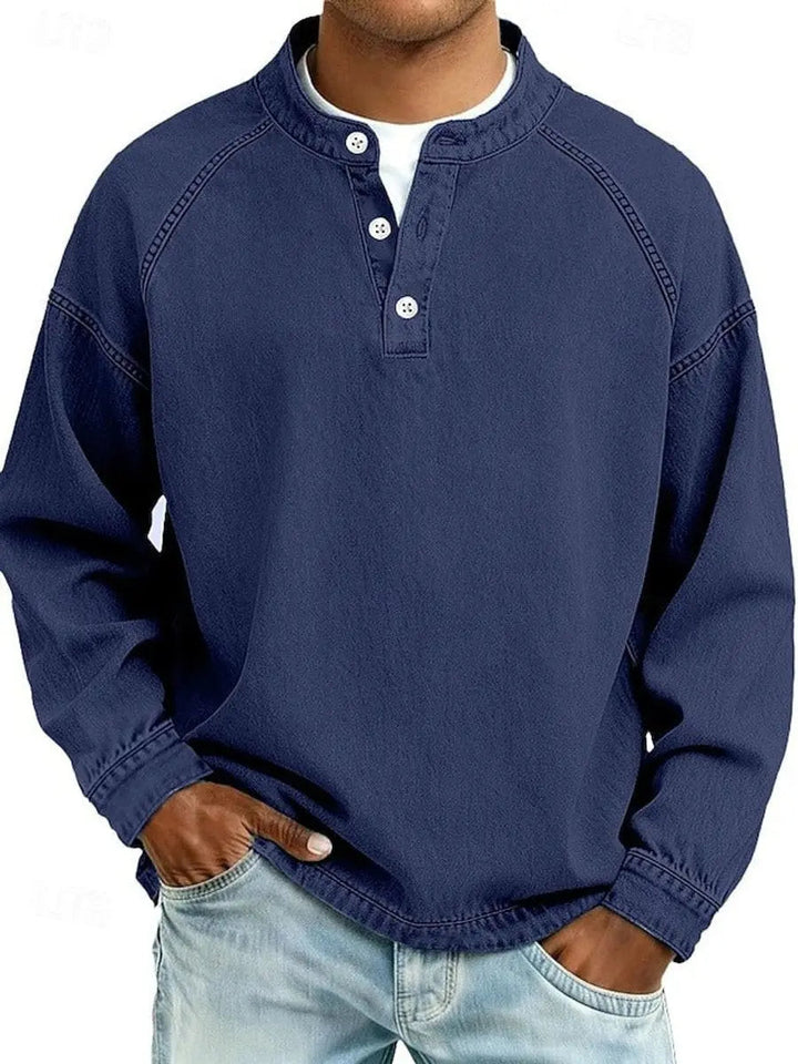 Dark men's vintage Henley long sleeve pullover shirt. Classic casual top for a timeless retro look.