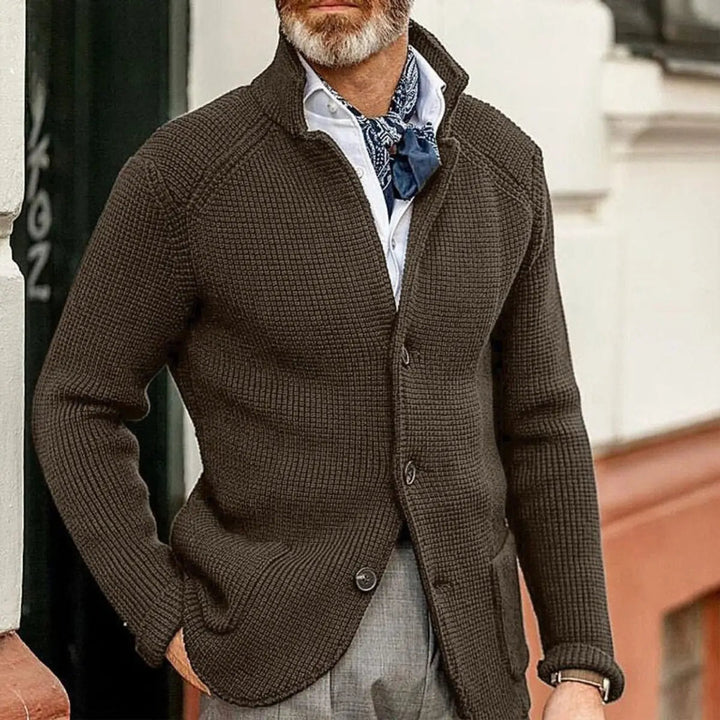 Waffle knit button-up men's cardigan with a relaxed fit and stand collar, perfect for everyday wear.