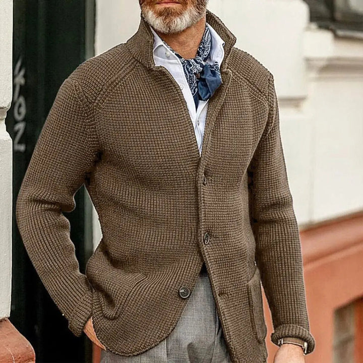 Comfortable men's relaxed fit waffle knit cardigan, a versatile button-up jumper for layering.
