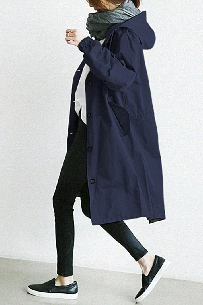 "Men's waterproof trench coat with hood, long tailored fit in black, showcasing stylish design and weather-resistant fabric."