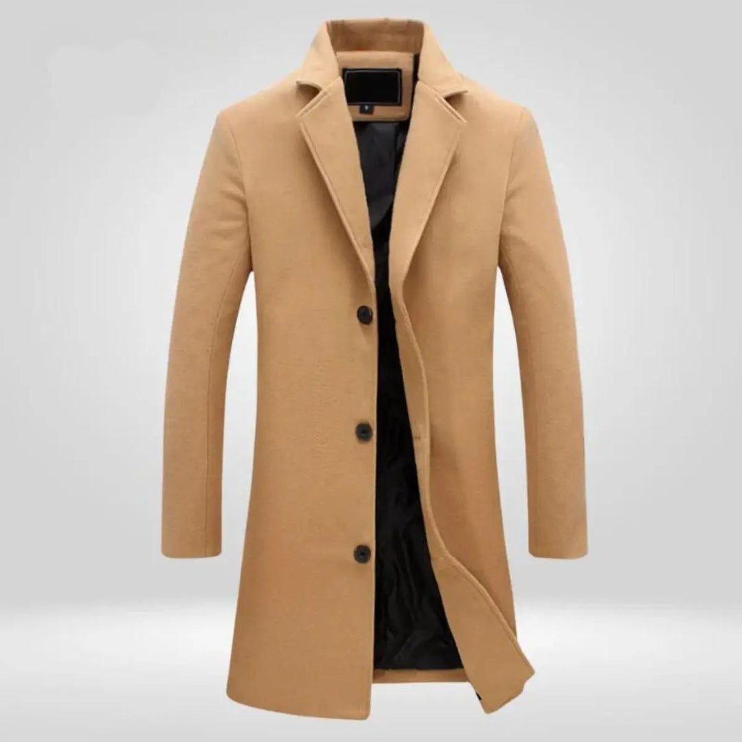 Men's black single-breasted long overcoat. Timeless tailored winter outerwear, perfect for smart men's fashion.