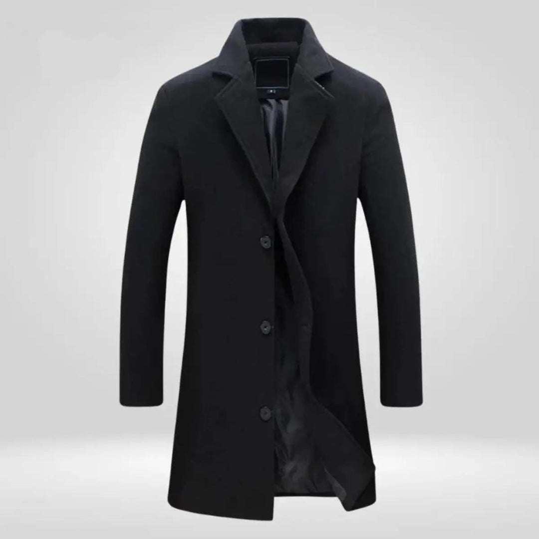Grey single-breasted long overcoat for men. Classic tailored design, versatile winter outerwear for formal and casual looks.