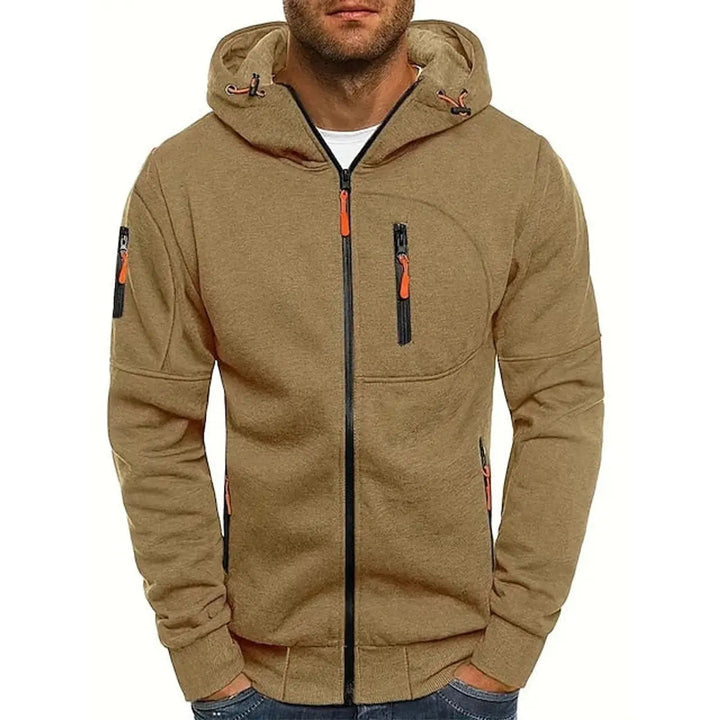 Active man in a men's multi-pocket zip-up hoodie, perfect for outdoor casual adventures & athletic everyday style.