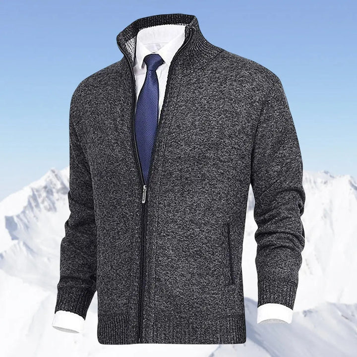 Detail of the sturdy zipper on a men's casual sweater, fleece-lined for warmth.