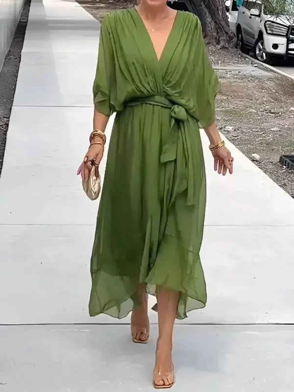 Elegant Women's V-Neck Midi Wrap Dress with flowing sleeves and tie waist, perfect for day to night wear.