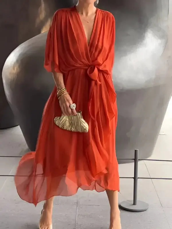 Ladies' versatile V-neck wrap dress, midi length, with flattering tie waist and elegant flowing sleeves.