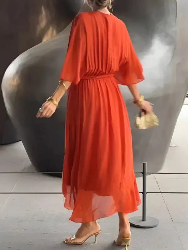 Fashionable women's summer midi dress, V-neck, wrap style, with a chic tie waist and comfy flowing sleeves.