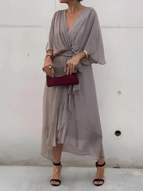 Versatile V-neck wrap midi dress, women's fashion, featuring a flattering tie waist and flowing sleeves.