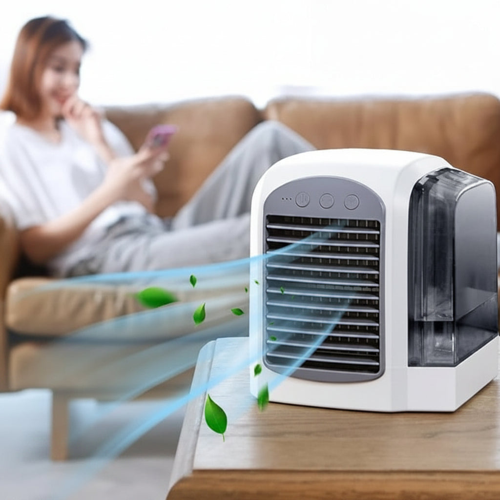 Rechargeable mini evaporative air cooler fan with oscillation for personal desk cooling.
