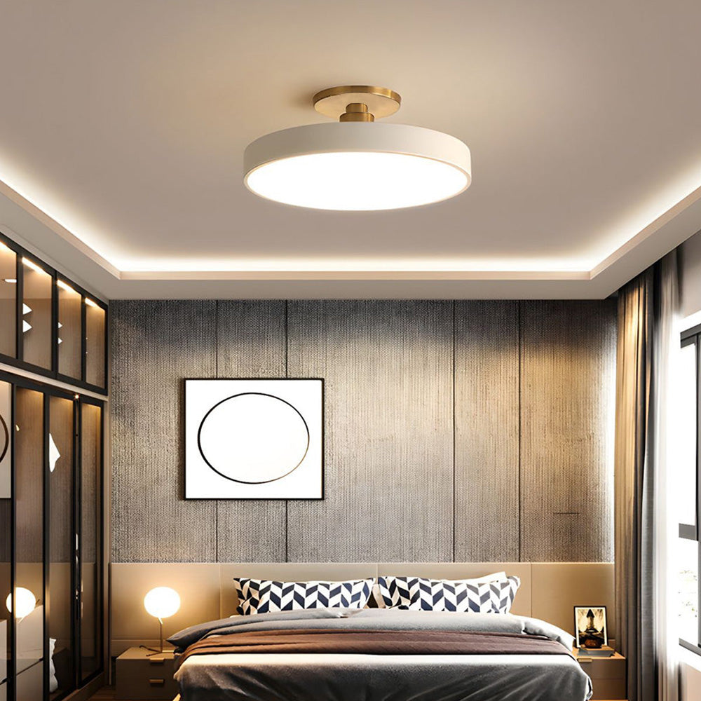 "Minimalist LED ceiling light, semi-flush design, brightens spaces with elegant style and energy-efficient glow."