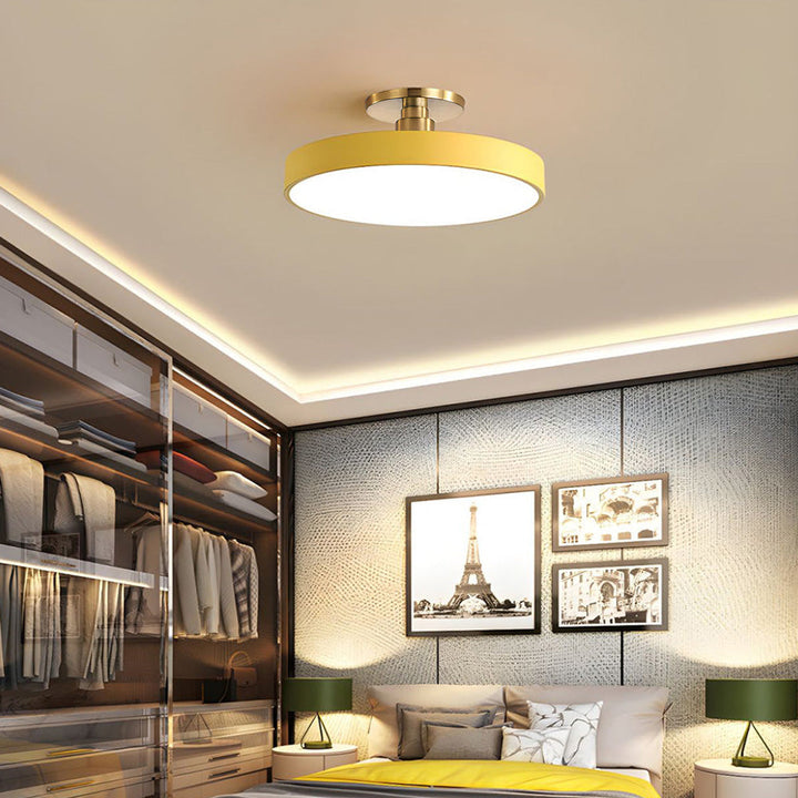 "Minimalist LED ceiling light, semi-flush design, brightens spaces with elegant style and energy-efficient glow."