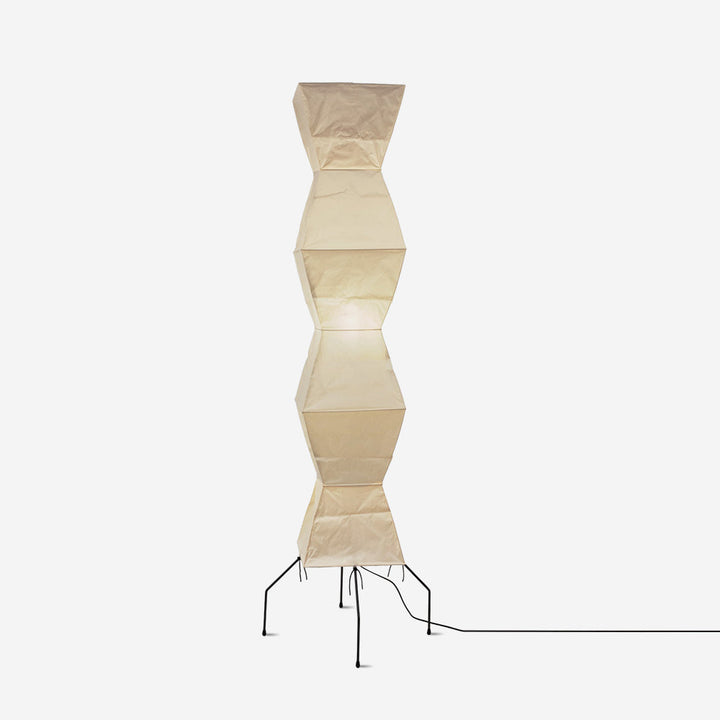"Minimalist rice paper floor lamp with sleek metal frame and soft diffused light, perfect for creating a warm ambiance."