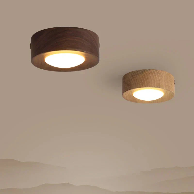 Walnut wood minimalist LED ceiling light, provides warm ambient lighting for living spaces.