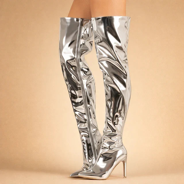 Stylish black over-the-knee boots for women, featuring a sharp pointed toe for a sophisticated look.