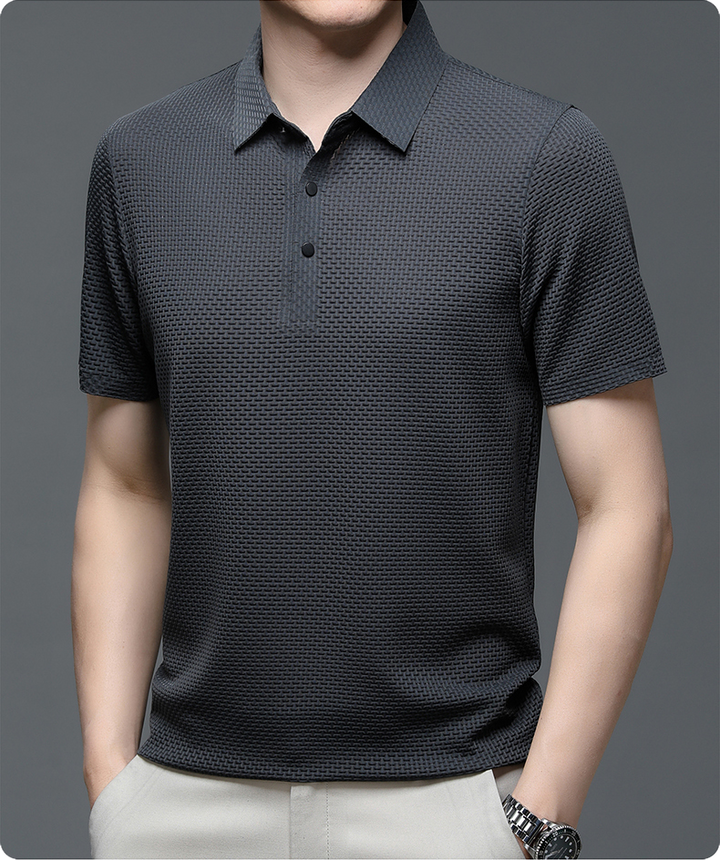 Close-up of a stylish men's button-up polo shirt, highlighting breathable fabric & summer comfort.