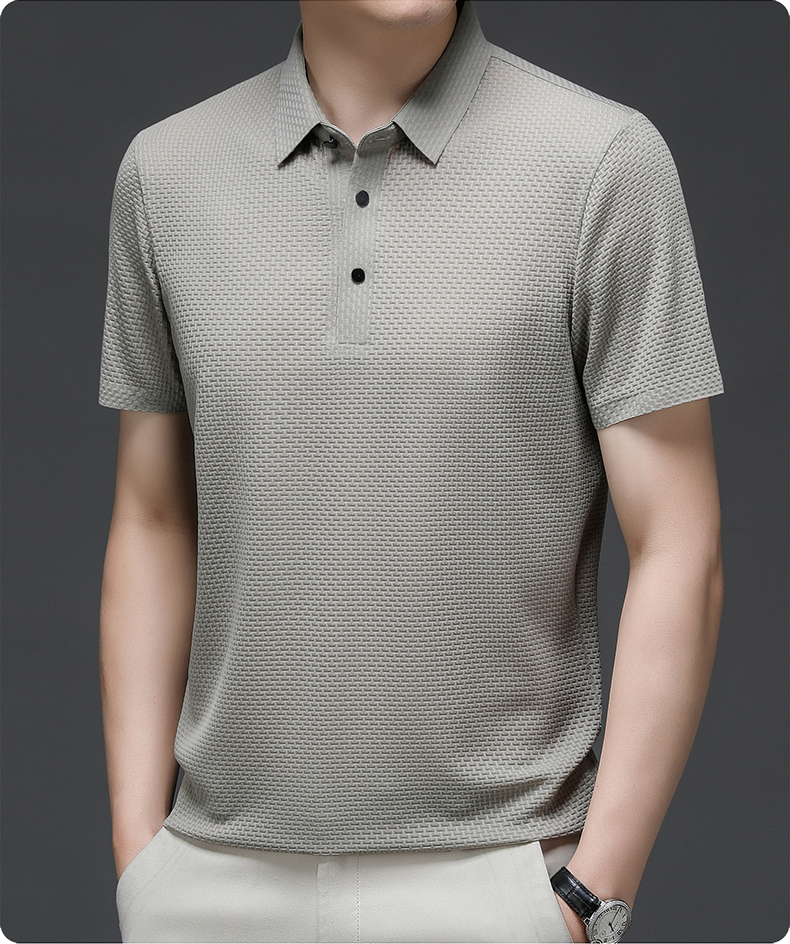 Model showcasing a comfortable, stylish men's short sleeve button-up polo for summer.