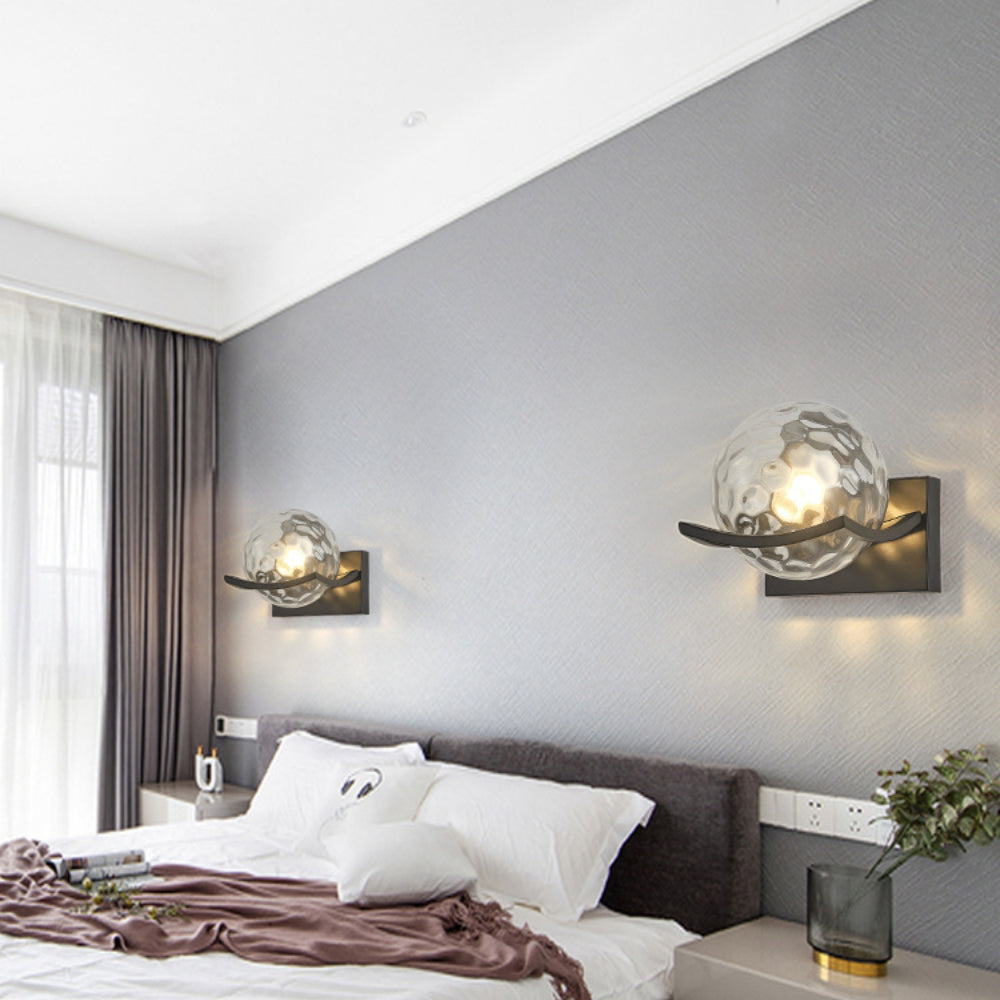 Modern LED wall lamp with sleek glass finish, ideal for contemporary home decor and energy-efficient lighting.