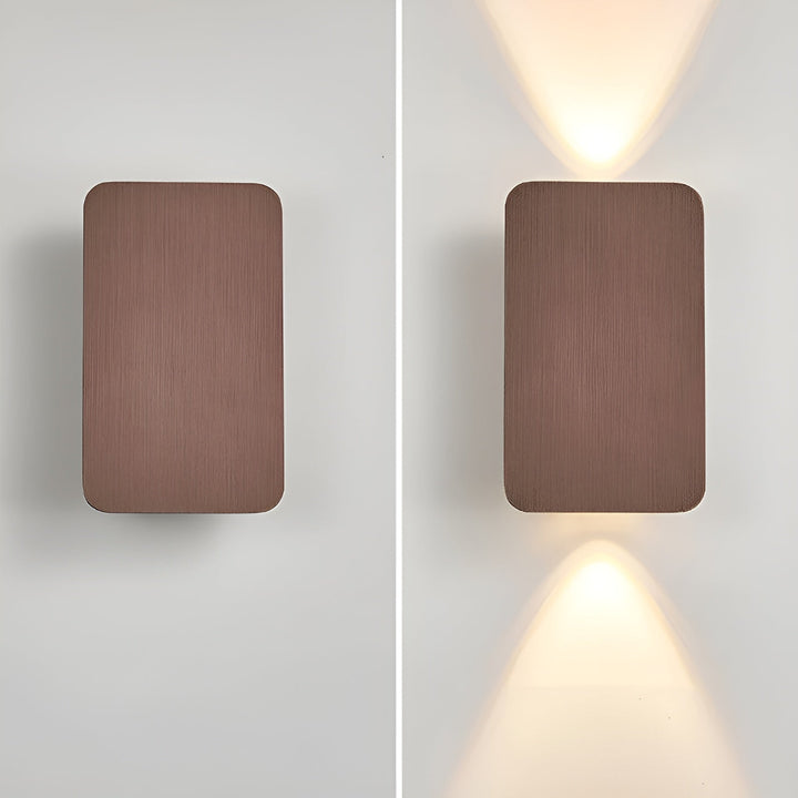 Stylish modern LED wall light, ideal for living rooms, hallways, providing ambient up/down glow.
