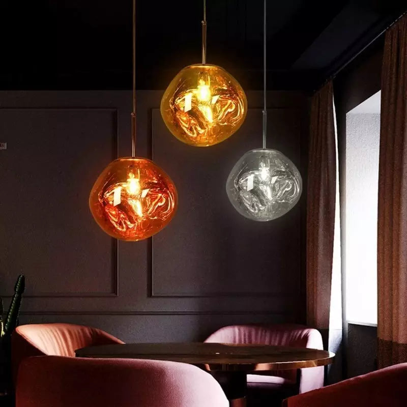 Designer Melt pendant, modern elegant metallic light, perfect for contemporary decor.