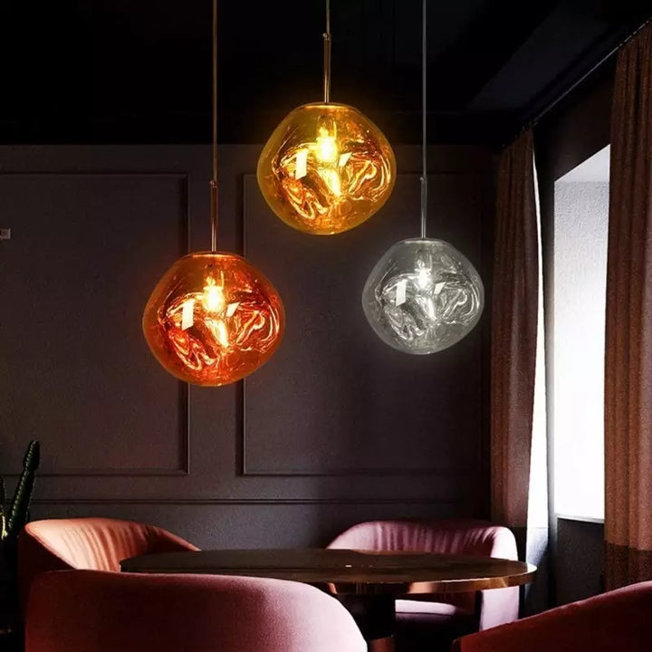 Designer Melt pendant, modern elegant metallic light, perfect for contemporary decor.
